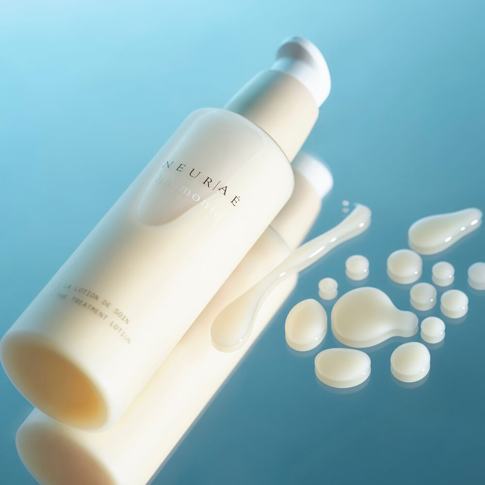 texture et flacon lotion de soin neura&eacute;