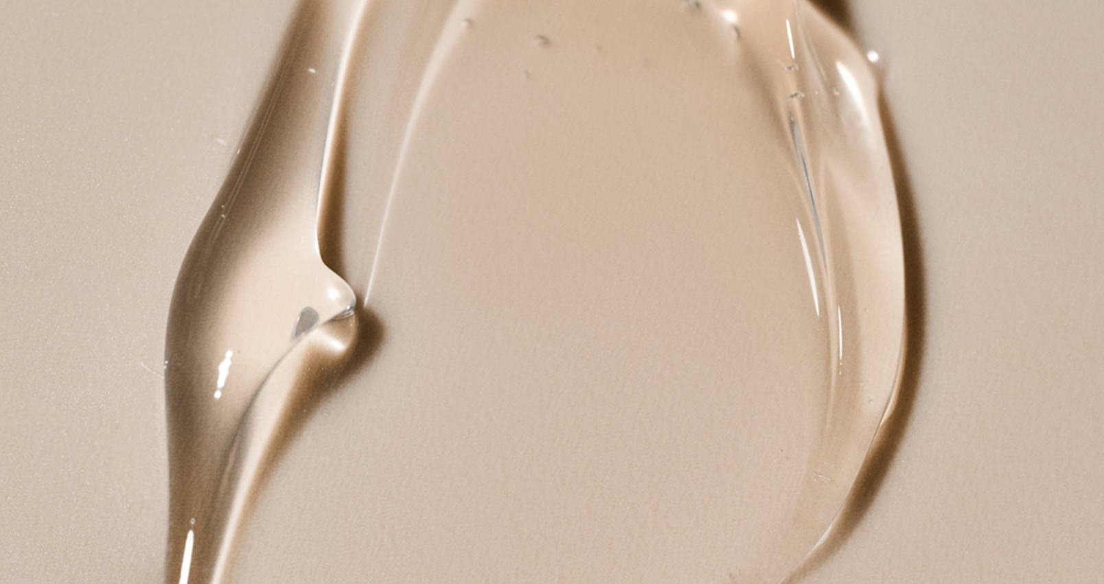 harmonie Caring Cleanser neuro-texture beige background